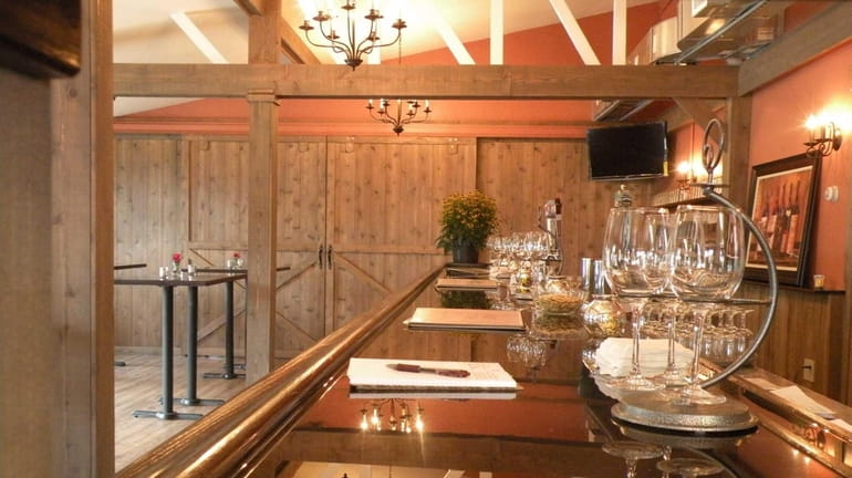 The North Fork Tasting Room in Baiting Hollow shares premises...