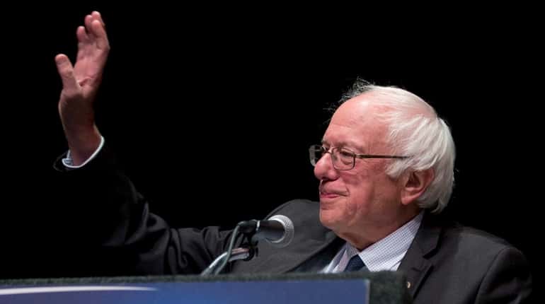 Democratic presidential candidate Sen. Bernie Sanders, I-Vt., gestures while giving...