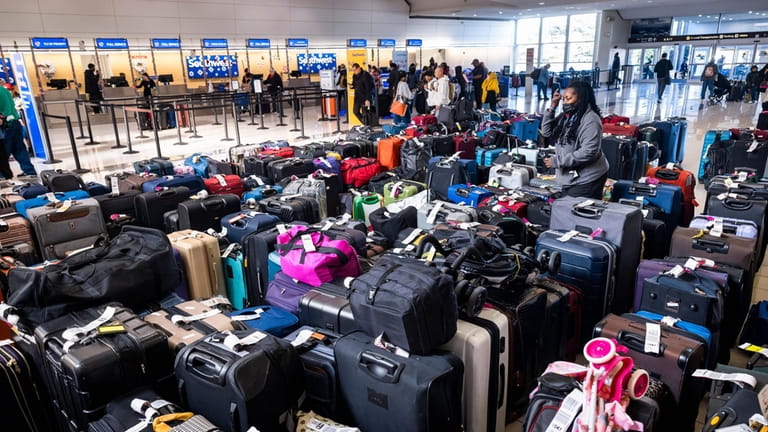 Hundreds of bags of luggage remain unclaimed at Washington National...