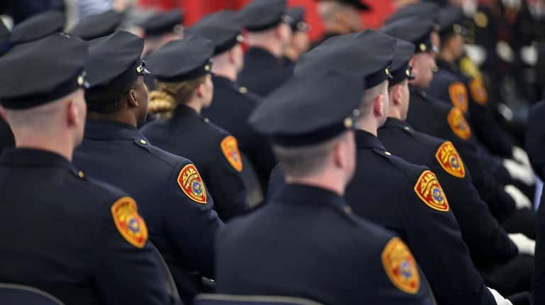 Suffolk County police recruits graduate in March 2017. From 2011...
