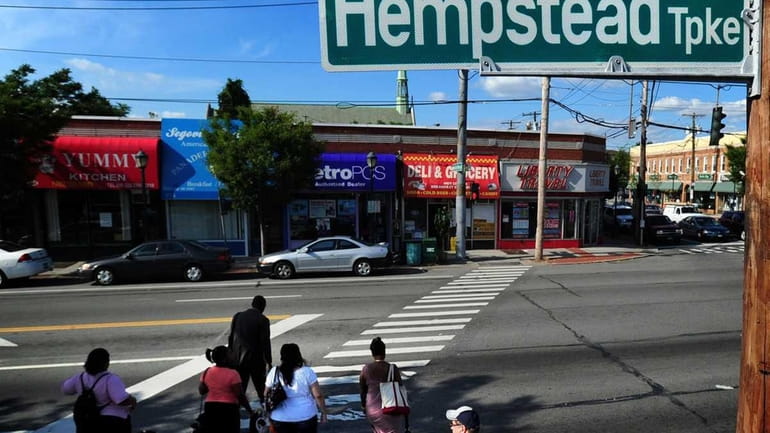 Pedestrians cross at the intersection of Franklin Avenue and Hempstead...