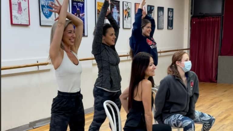 Adult dancers from the NY Dancers Studio prepare for an...