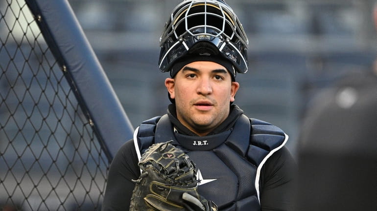 New York Yankees catcher Jose Trevino looks on during an...