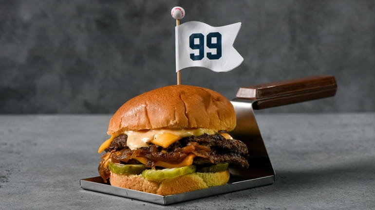 The 99 Burger features two smashed 4 oz beef patties,...