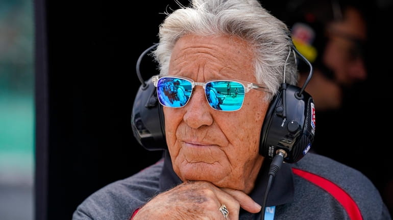 1969 Indy 500 champion Mario Andretti watches from his grandson...