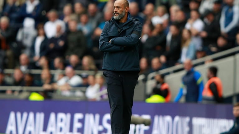 Then Tottenham's head coach Nuno Espirito Santo looks on during...