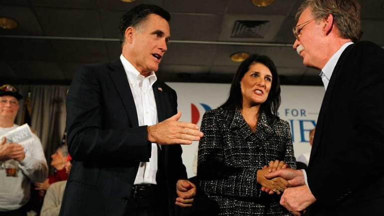 Republican presidential candidate, former Massachusetts Gov. Mitt Romney (L), South...