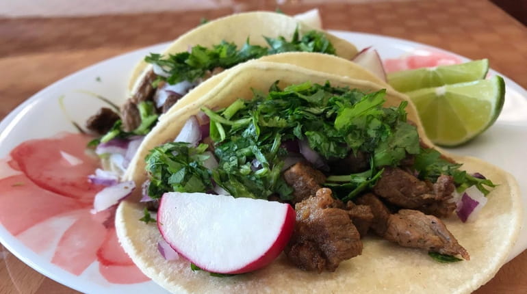 Steak tacos at Mi Puebla Restaurant & Grill, which opened...