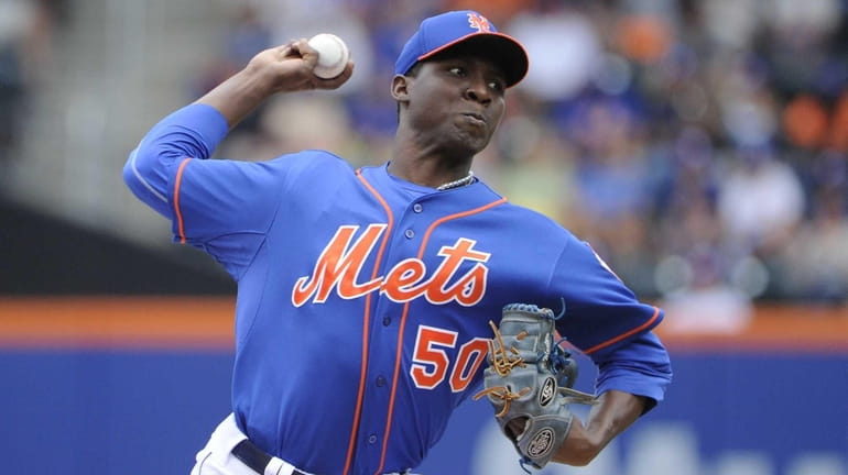 Mets starting pitcher Rafael Montero delivers a pitch during a...
