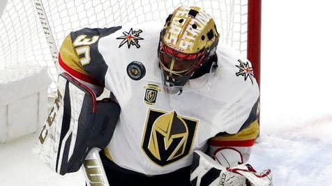 Vegas Golden Knights goalie Malcolm Subban stops a shot by...