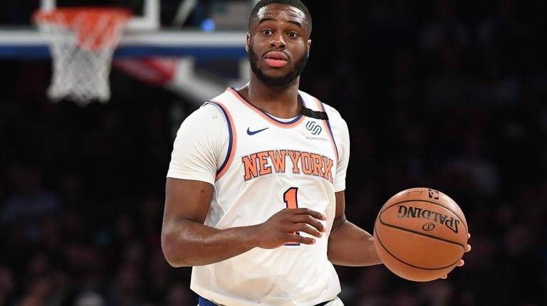 New York Knicks guard Emmanuel Mudiay brings the ball up...