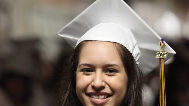 Luisa Gonzalez, 17, poses for a portrait during her graduation...