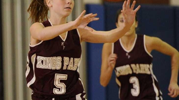 Kings Park's guard Shannon Ahern passes against Northport in the...