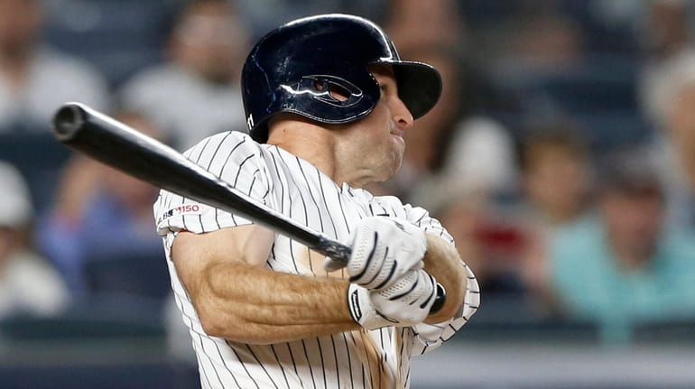 Yankees outfielder Brett Gardner bats during the eighth inning against...