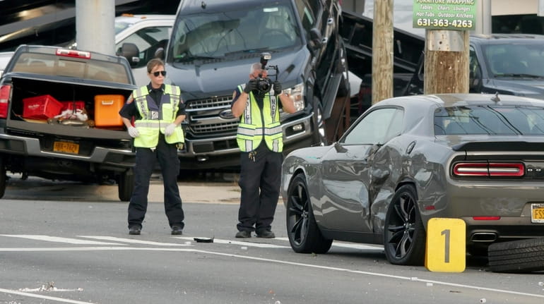 Nassau County police at the scene where the pickup truck,...
