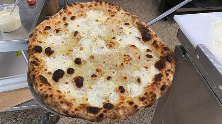 The cacio e pepe pizza at King Umberto in Elmont...