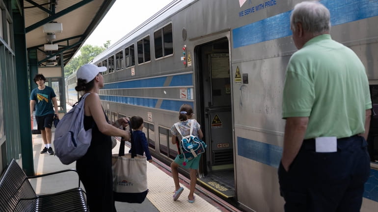 Riders at the Oyster Bay train station on July 17. 