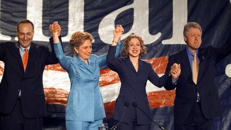 The Clintons and Sen. Chuck Schumer (D-N.Y.) celebrate Hillary Clinton's...