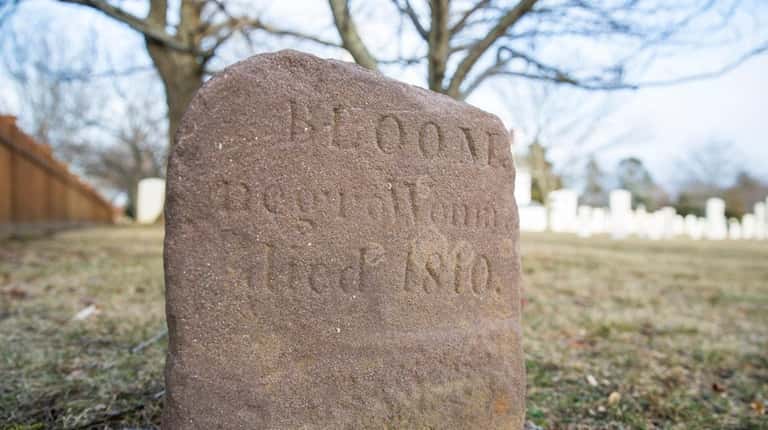 The headstone of "Bloom," buried in Southold at the oldest...