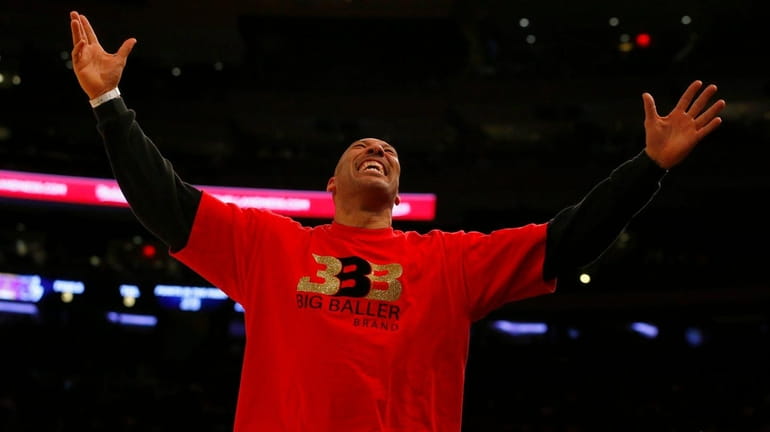 LaVar Ball reacts after a basket by his son Lonzo...
