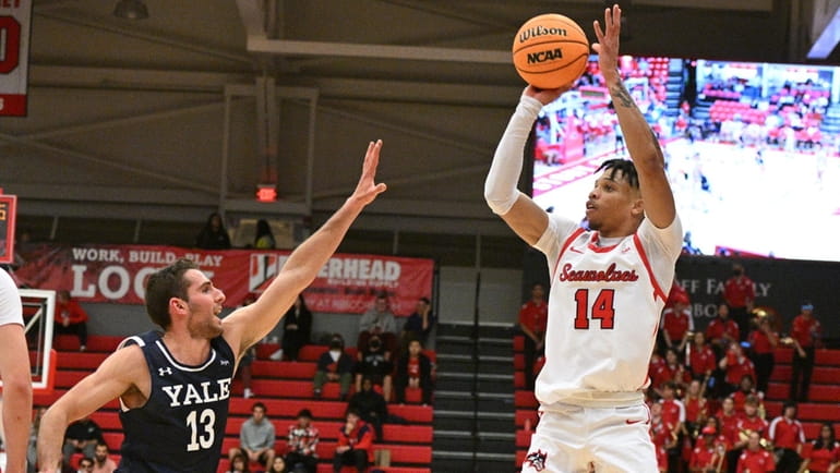 Stony Brook guard Tyler Stephenson-Moore shoots for a three-point basket...