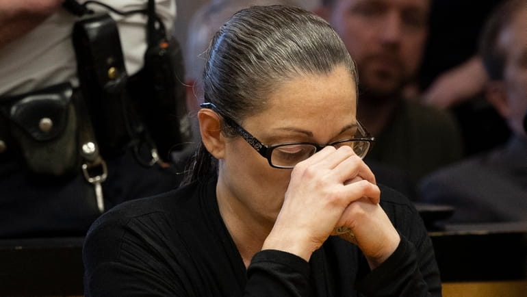 Angela Pollina reacts as guilty murder verdict is read Friday in...
