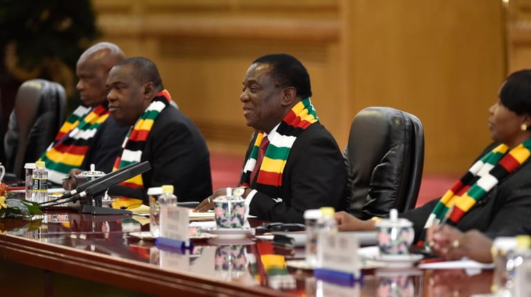 Zimbabwean President Emmerson Mnangagwa, second from right, who took power...