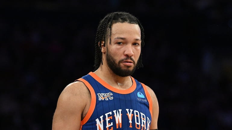 New York Knicks guard Jalen Brunson looks on against the...