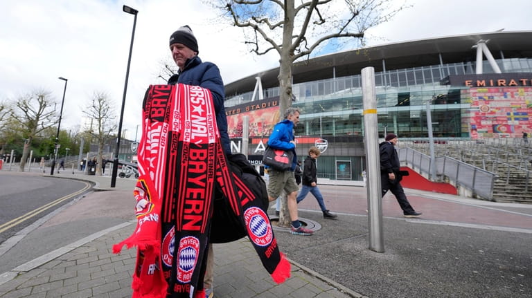 A memorabilia vendor outside Arsenal's Emirates Stadium ahead of the...