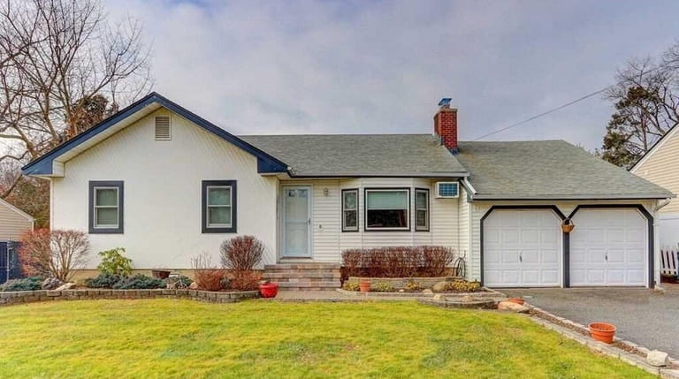 This Melville ranch, for $529,000, includes four bedrooms and two...