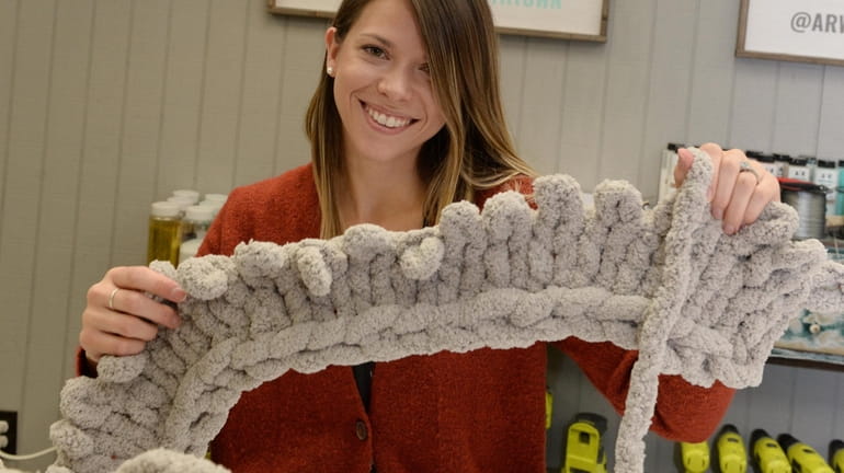 Devyn Ronca of Setauket makes a chunky knit blanket at...