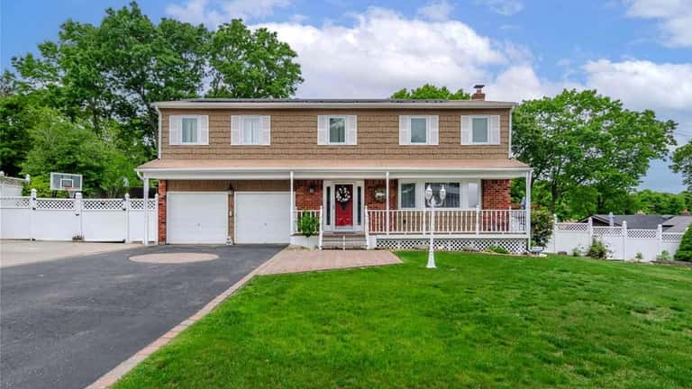 Priced at $619,000, this Colonial on Avenue D has 3,000...