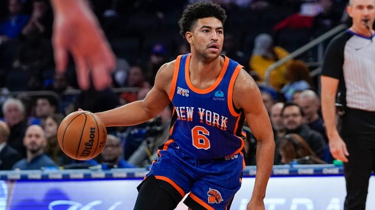 Knicks guard Quentin Grimes (6) handles the ball during the...
