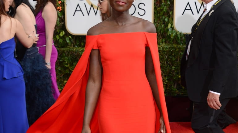 Nominee Lupita Nyong'o stunned on the red carpet with her...