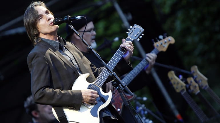 US-musician Jackson Browne, left, performs during an open air concert...