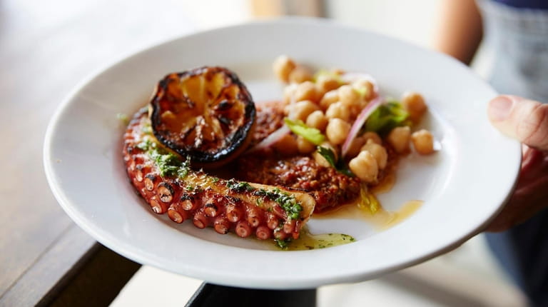 Charred octopus with lemon and chickpeas at Lost & Found...