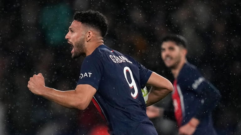 PSG's Goncalo Ramos celebrates after scoring his side's third goal...