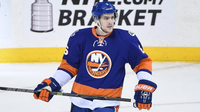 New York Islanders defenseman Ryan Pulock looks on from the...