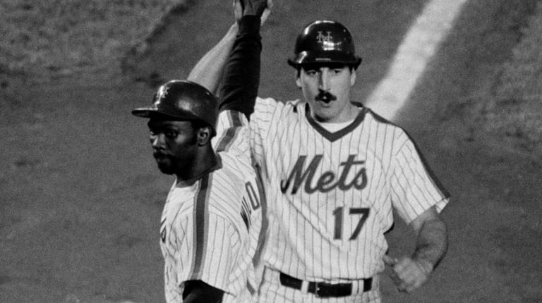 Keith Hernandez crosses the plate after a first-inning home run at...