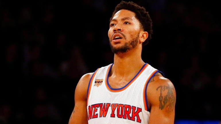 Derrick Rose of the Knicks reacts after a foul during...