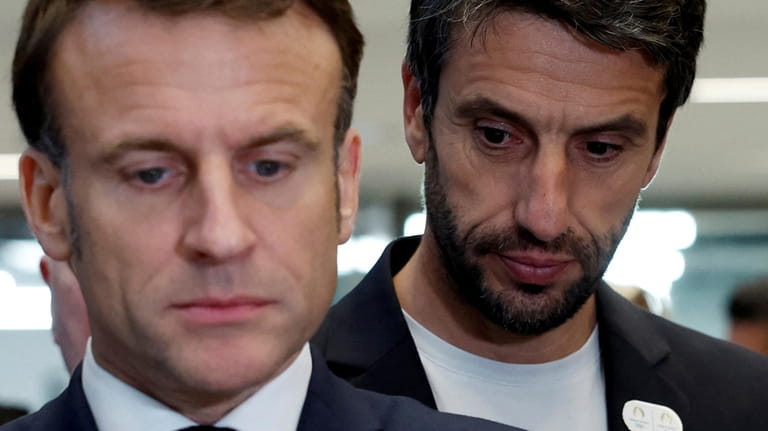 French President Emmanuel Macron and Tony Estanguet, president of the...
