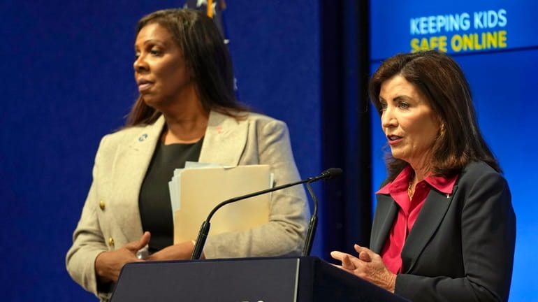 Gov. Kathy Hochul, right, speaks next to Attorney General Letitia...