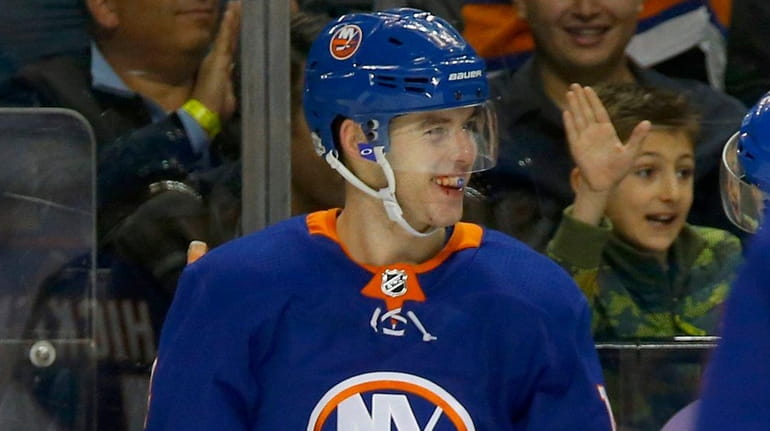 Thomas Hickey of the Islanders celebrates his goal against the...