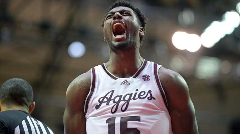 Texas A&M forward Henry Coleman III (15) celebrates after scoring...