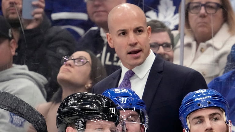 Spencer Carbery assistant for the Toronto Maple Leafs looks on...