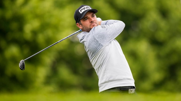 Canadian Corey Conners tees off on the 10th hole during...
