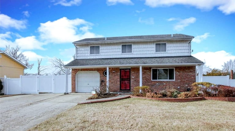 This three-bedroom, 1½-bathroom splanch in Central Islip is on the market...