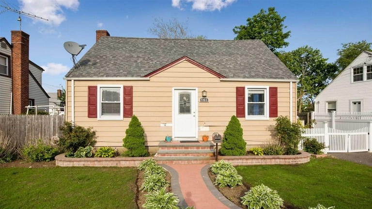 This Uniondale Cape is listed for $479,000.