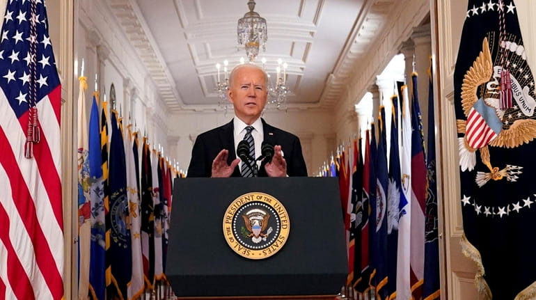 President Joe Biden speaks about U.S. progress a year into...
