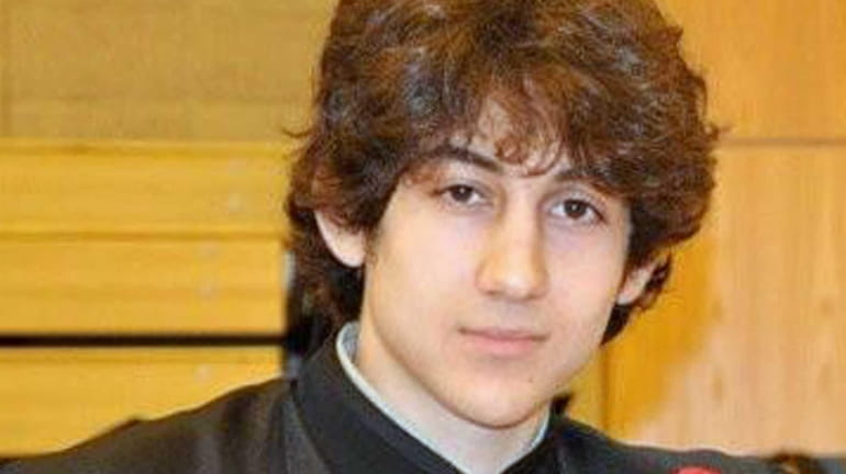 Dzhokhar Tsarnaev poses for a photo after graduating from Cambridge...